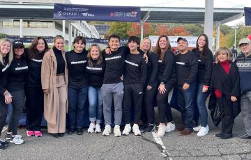 Tiffany surrounded by her family and friends at a Light The Night event