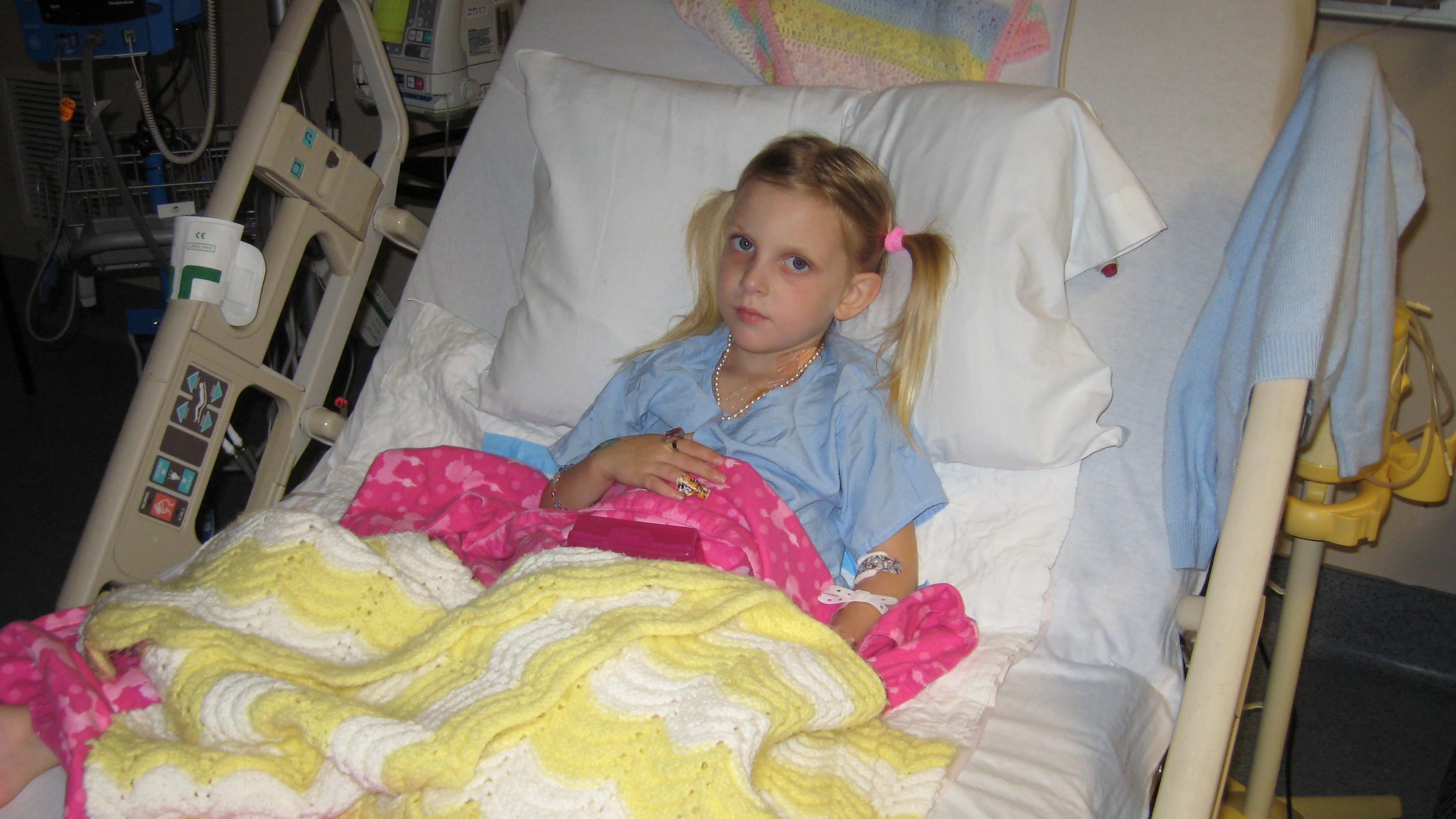 Young Mollie in a hospital bed