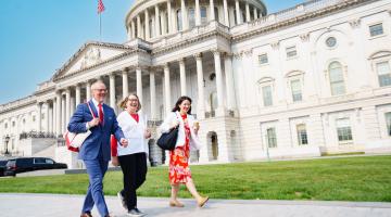 Advocates walking in front of the U.S. Capitol