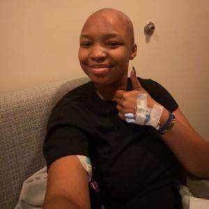 matilda lymphoma black shirt thumbs up world cancer day