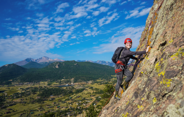 Mara HL survivor climbing mountain